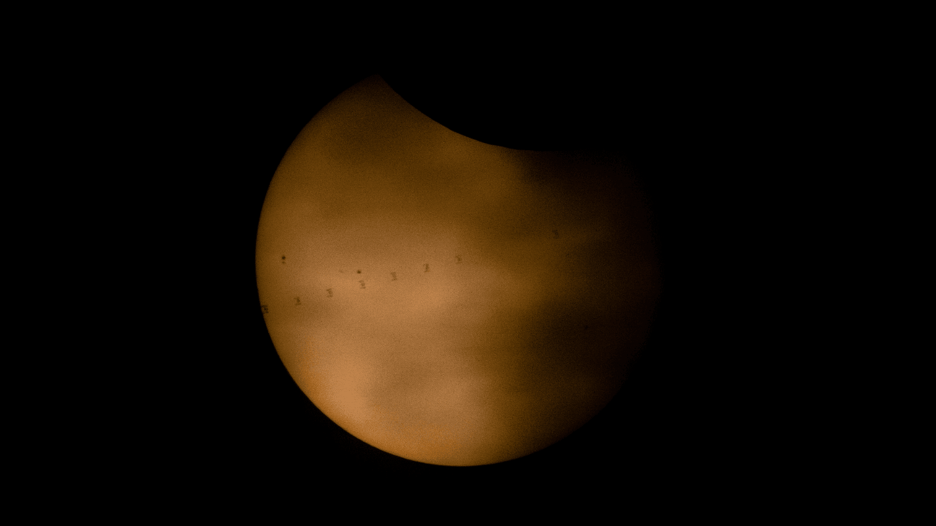 ISS photobombs the sun during solar eclipse