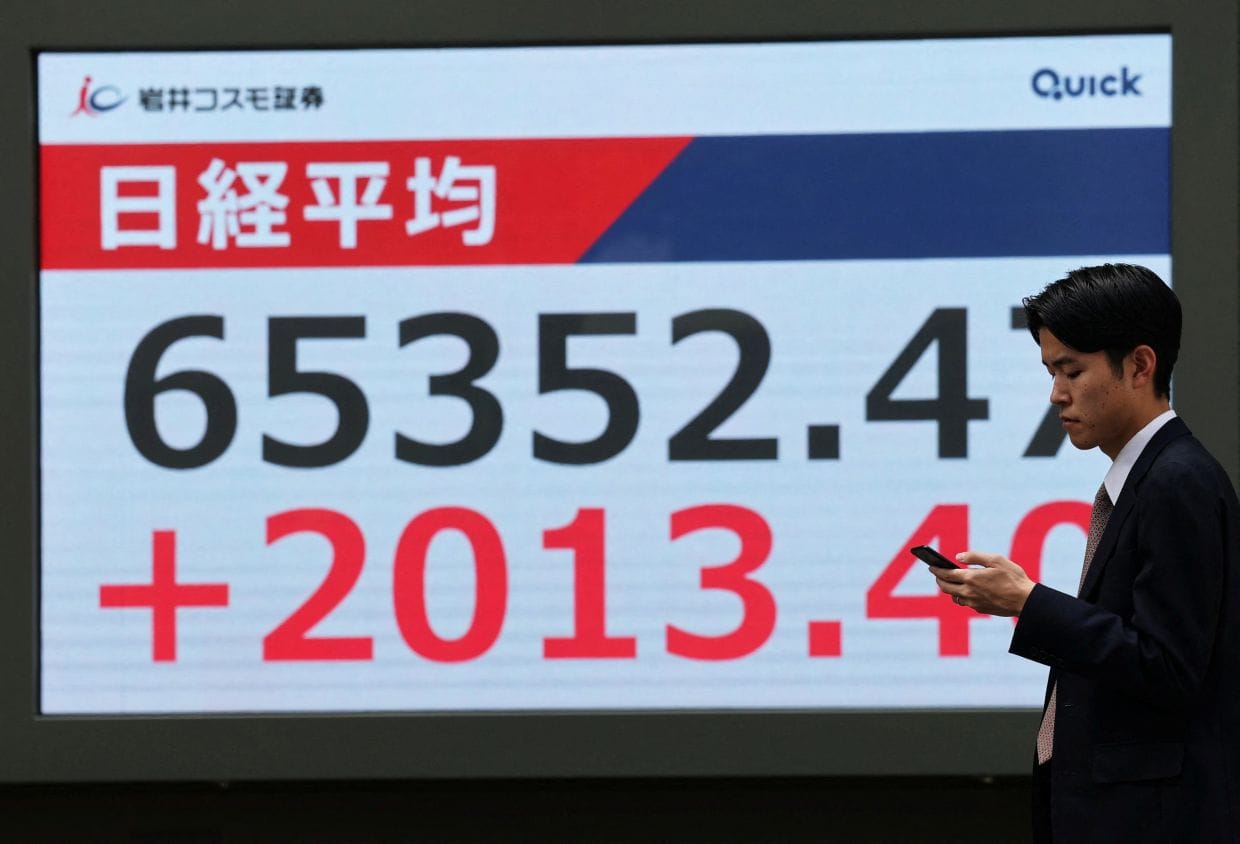 Japan's Nikkei jumps past 65,000 mark for first time on Iran talks optimism