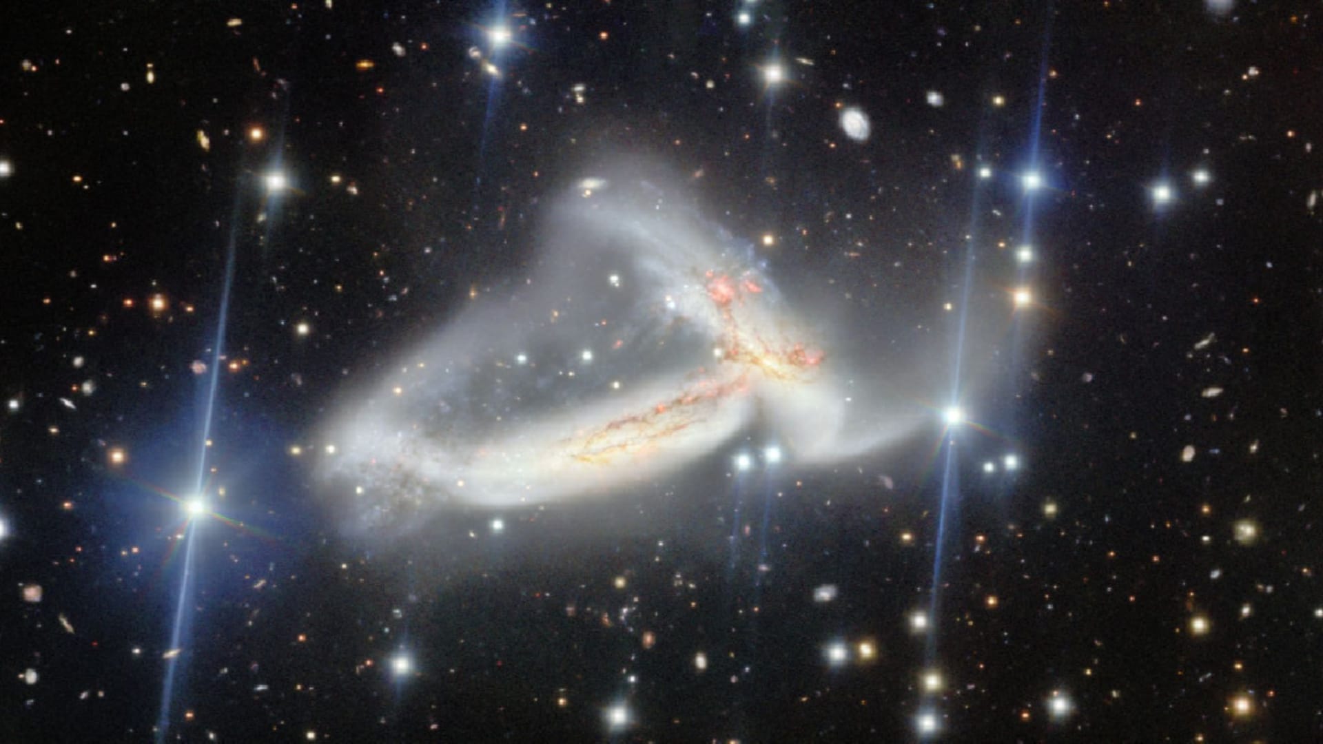 Galaxies tangled in science and spirit