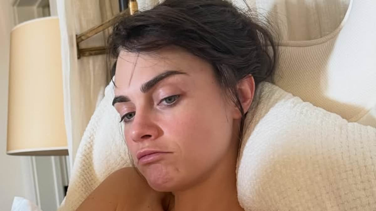 Cara Delevingne abbraccia la sua nuova immagine provocante posando topless a letto con il suo gatto dopo il servizio per Playboy e un video musicale osé