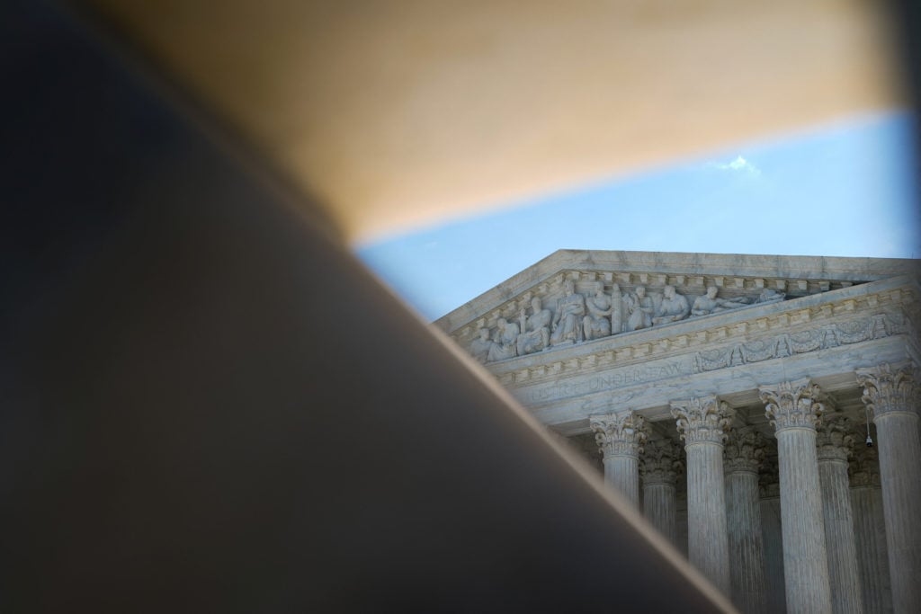 Supreme Court clears way for Trump administration to revive restrictive immigration policy