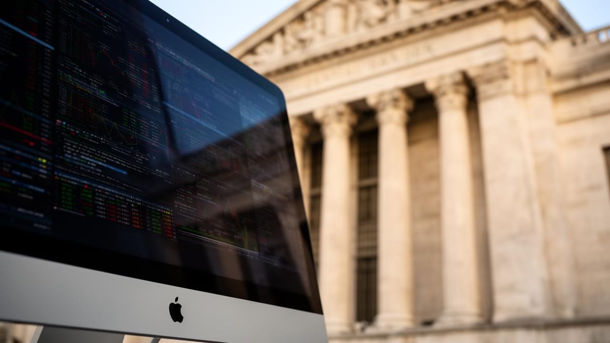 La decisione sui tassi della Fed coincide con i risultati di Apple e Microsoft mentre i mercati globali affrontano la prova della 'super-week' — BigGo Finance
