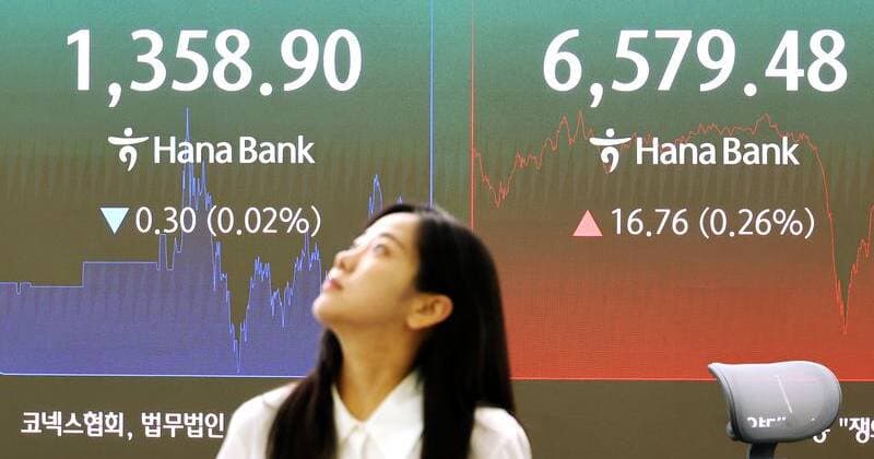 Ações asiáticas fecham em alta após queda nos preços do petróleo